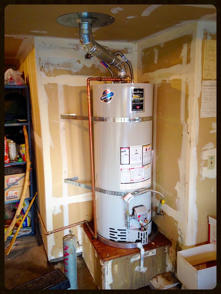 New Bradford White water heater installed in an unfinished basement.