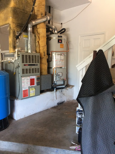 Newly repaired water heater in a garage in Milpitas, California