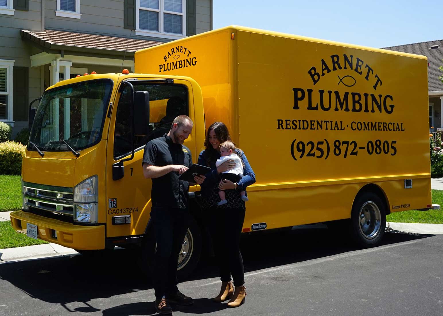 Barnett Plumbing technician with service truck