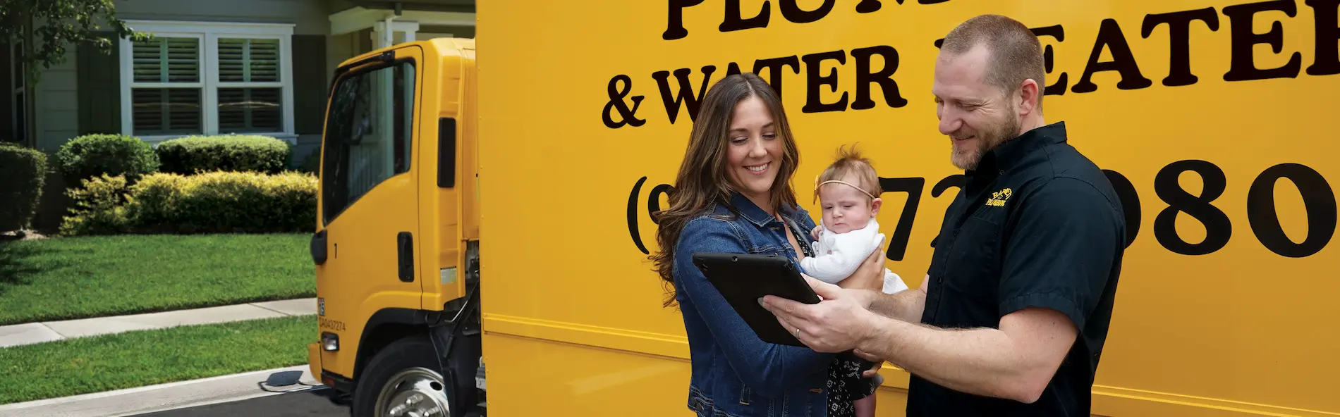 Barnett Plumbing technician discussing plumbing options with a homeowner