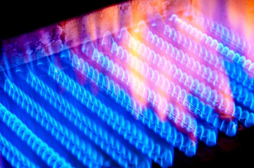 A close up of a gas water heater